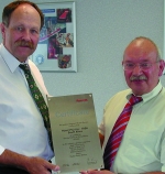 Ulf Hassdenteufel, engineering director (left), receives the Bosch Rexroth Service Centre of  Competence Certificate from Günther Feil, vice president, BRM-MS Mobile Service (Business Unit) Bosch Rexroth (right), who carried out the audit on Hytec’s main repair and service centre